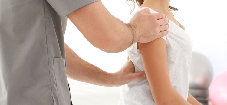 bigstock-Physiotherapist-working-with-p-168310400