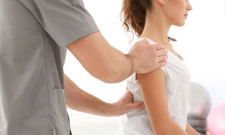 bigstock-Physiotherapist-working-with-p-168310400