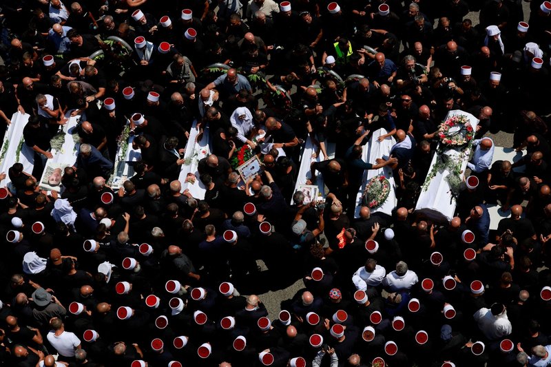 2024-07-28T082310Z_327936649_RC2849AX9U8R_RTRMADP_5_ISRAEL-PALESTINIANS-LEBANON-FUNERALS